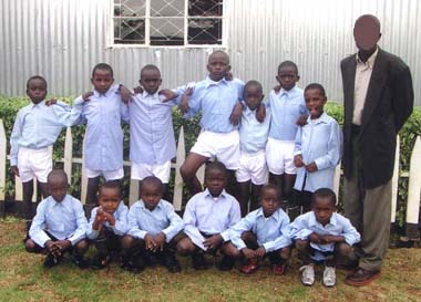 Children trying on items from the container